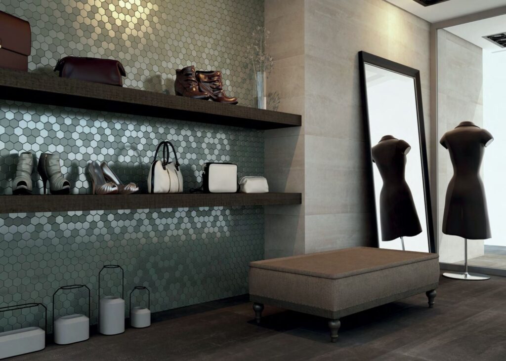 Capture+1-5de20b72-1920w.JPG Boutique room with shelves of bags and shoes, mannequins, a large mirror, and an ottoman.