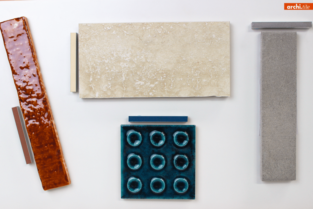 IMG_3215-1920w.png Four textured tiles of different shapes and colors displayed on a white background.