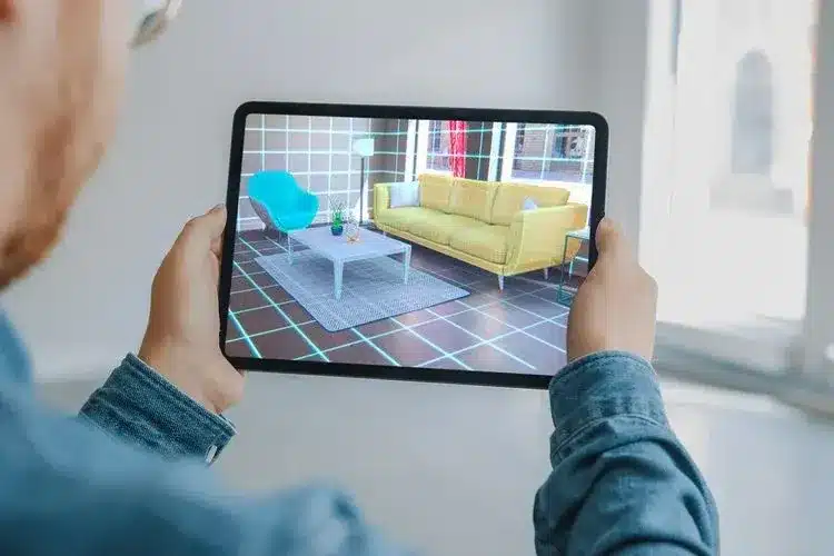 Person using augmented reality on tablet device