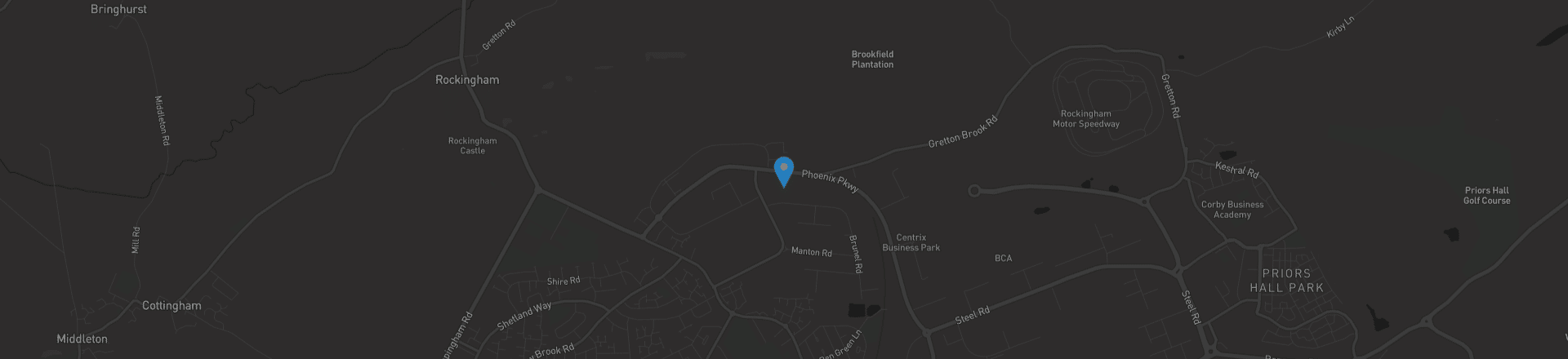 A map with a blue pin marking a specific location near Rockingham and Corby.