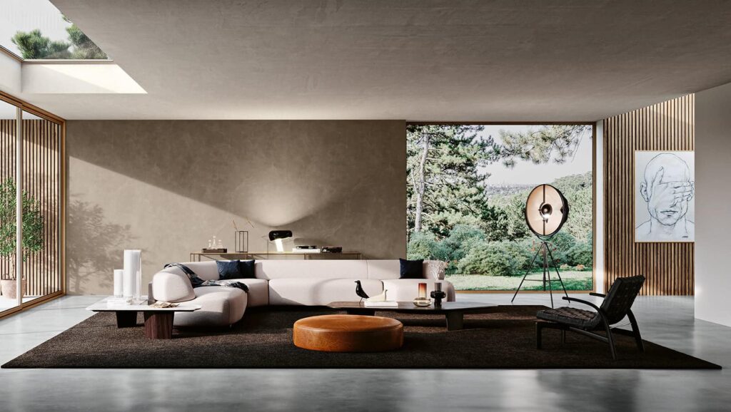 Modern concrete lounge with large windows, minimalist furniture, and a view of greenery outside.