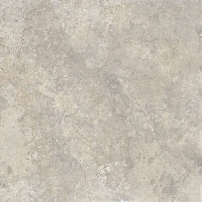 Light gray textured stone or tile surface.
