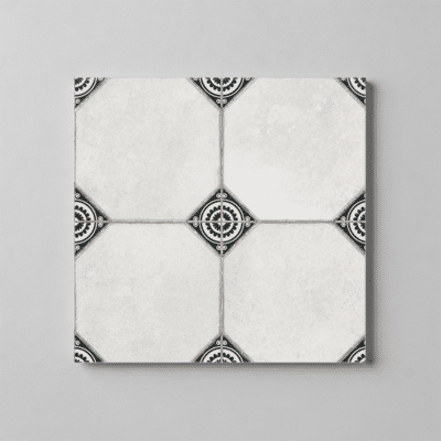 White tile with black geometric corner accents forming a subtle pattern on a gray background.
